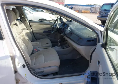 2010 Honda Insight Ex from USA, damaged, VIN JHMZE2H74AS016342